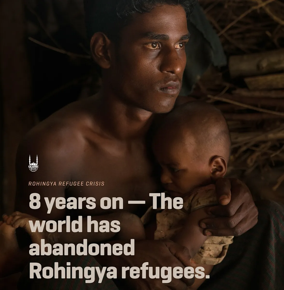 Man waving outside a shelter in the Philippines